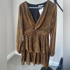 Black & orange dotted long sleeve trendy dress. Purchased from a local boutique